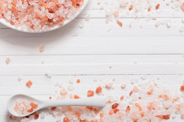 himalayan salt on white wooden background