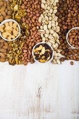 Nuts on a  wooden table.