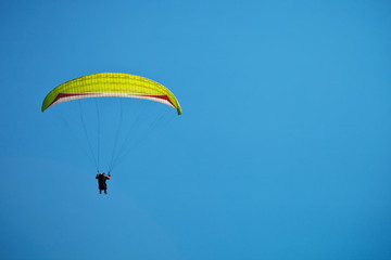 Paragliding along beautiful coastline.