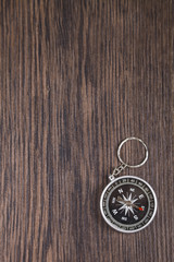 Compass on a wooden table