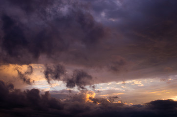Fototapeta na wymiar Storm clouds in the sunset light