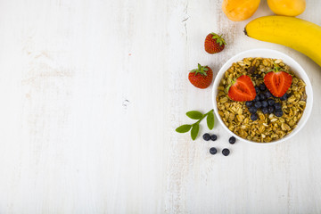 Granola with strawberry  and blueberries