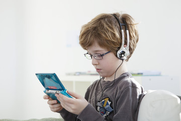 Child playing with video game