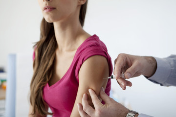Vaccinating a woman