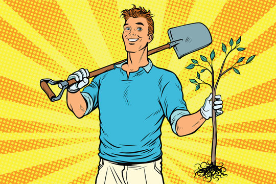 Man gardener with a shovel and sapling