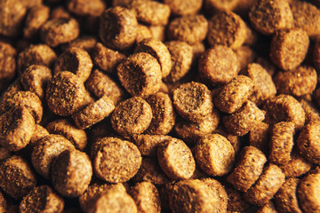 Dried dog and cat food background macro . cat food wallpaper closeup