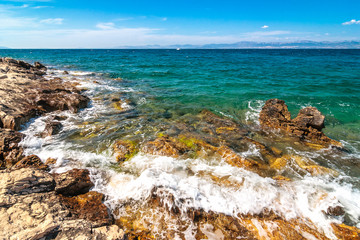 The view at the sea and coast of Croatia from the island of Brac.