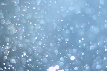 A beautiful and blurry bokeh on a blue background.