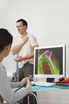 Models On screen, recolorized x-ray of a fracture of the clavicle