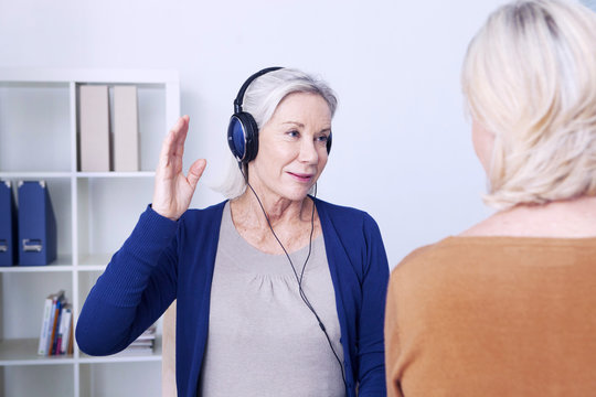 Senior Woman Undergoing A Hearing Test