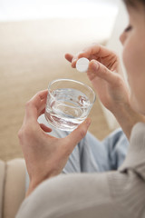 Woman taking medication