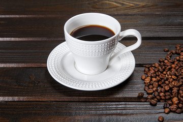 Coffee mug and coffee beans.