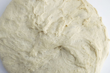 Kneading dough, fermented dough in a basin, dough for making bread
