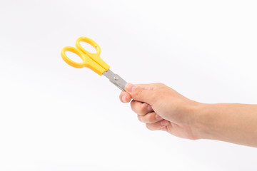 Female hands on a white background with scissors