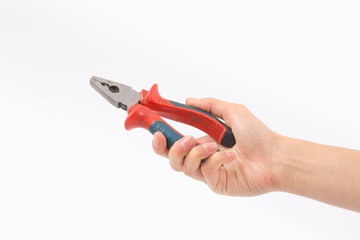 Obraz premium Female hands on a white background with pliers