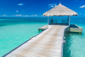 Tropical Beach with Water-Bungalows on the Maldives