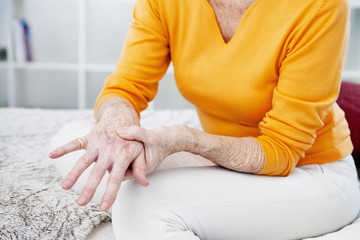 Senior woman with hand pain