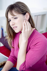 Woman suffering from earache