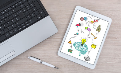 Business idea concept on a digital tablet