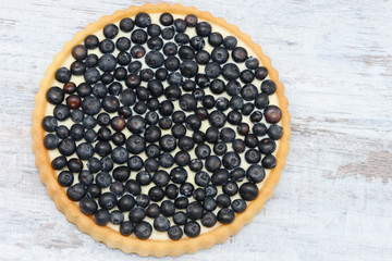 blueberry fruit cake on wood