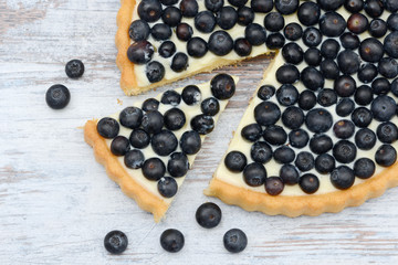 blueberry fruit cake on wood