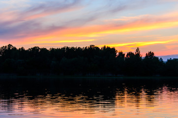 Obraz na płótnie Canvas Beautiful sunset over the river Dnieper