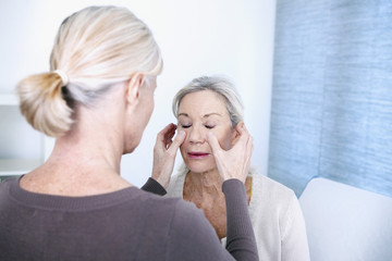 Doctor examining a patient's sinuses