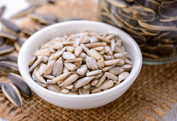 Sunflower seeds in wood bowl