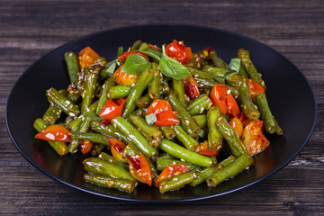 Healthy green beans, red cherry tomato with sesame seeds - Powered by Adobe