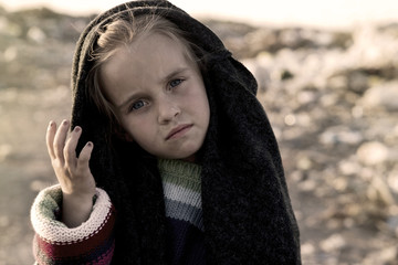 The poor little girl in a landfill