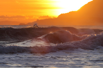 Fototapeta na wymiar Surf al tramonto