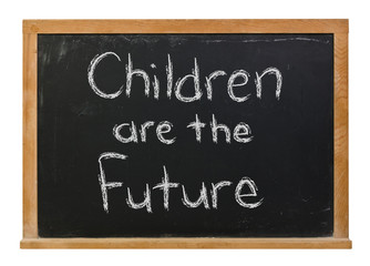 Children are the Future written in white chalk on a black chalkboard isolated on white