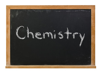 Obraz premium Chemistry written in white chalk on a black chalkboard isolated on white