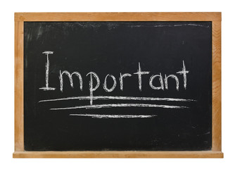 Obraz premium Important written in white chalk on a black chalkboard isolated on white