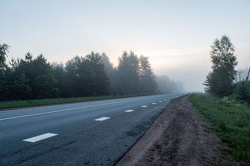Fototapeta premium empty road in the countryside in summer