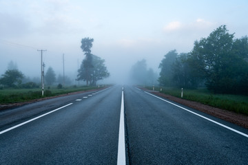 Fototapeta premium empty road in the countryside in summer