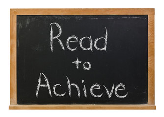 Obraz premium Read to achieve written in white chalk on a black chalkboard isolated on white