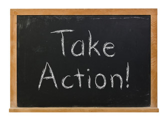 Obraz premium Take Action written in white chalk on a black chalkboard isolated on white