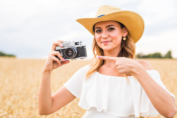 Retro photographer using old camera