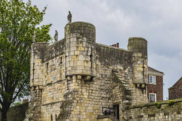 Buildings and the 13th Century Medieval wall which surrounds the City of York in northeast England. 