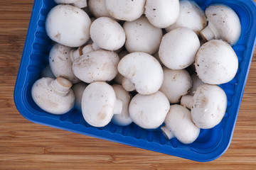 Champignon mushrooms in a package