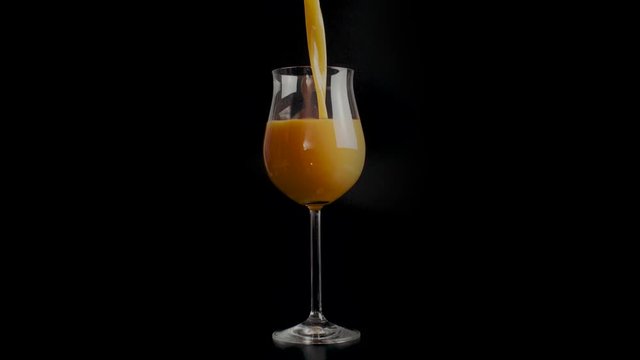 Cinemagraph Loop Pour Orange Juice in a Glass