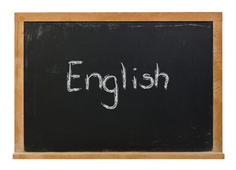 Fototapeta premium English written in white chalk on a black chalkboard isolated on white