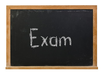 Obraz premium Exam written in white chalk on a black chalkboard isolated on white