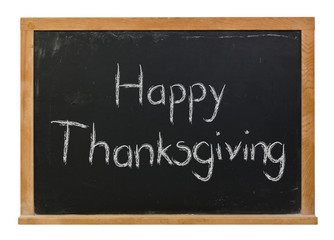 Obraz premium Happy Thanksgiving written in white chalk on a black chalkboard isolated on white