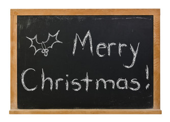 Merry Christmas written in white chalk on a black chalkboard isolated on white
