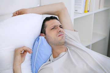 Man lying in bed