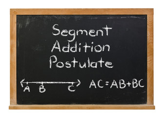 Obraz premium Segment addition postulate written in white chalk on a black chalkboard isolated on white
