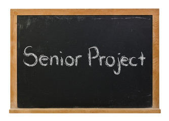 Obraz premium Senior Project written in white chalk on a black chalkboard isolated on white