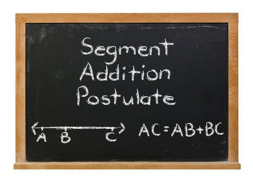 Segment addition postulate written in white chalk on a black chalkboard isolated on white